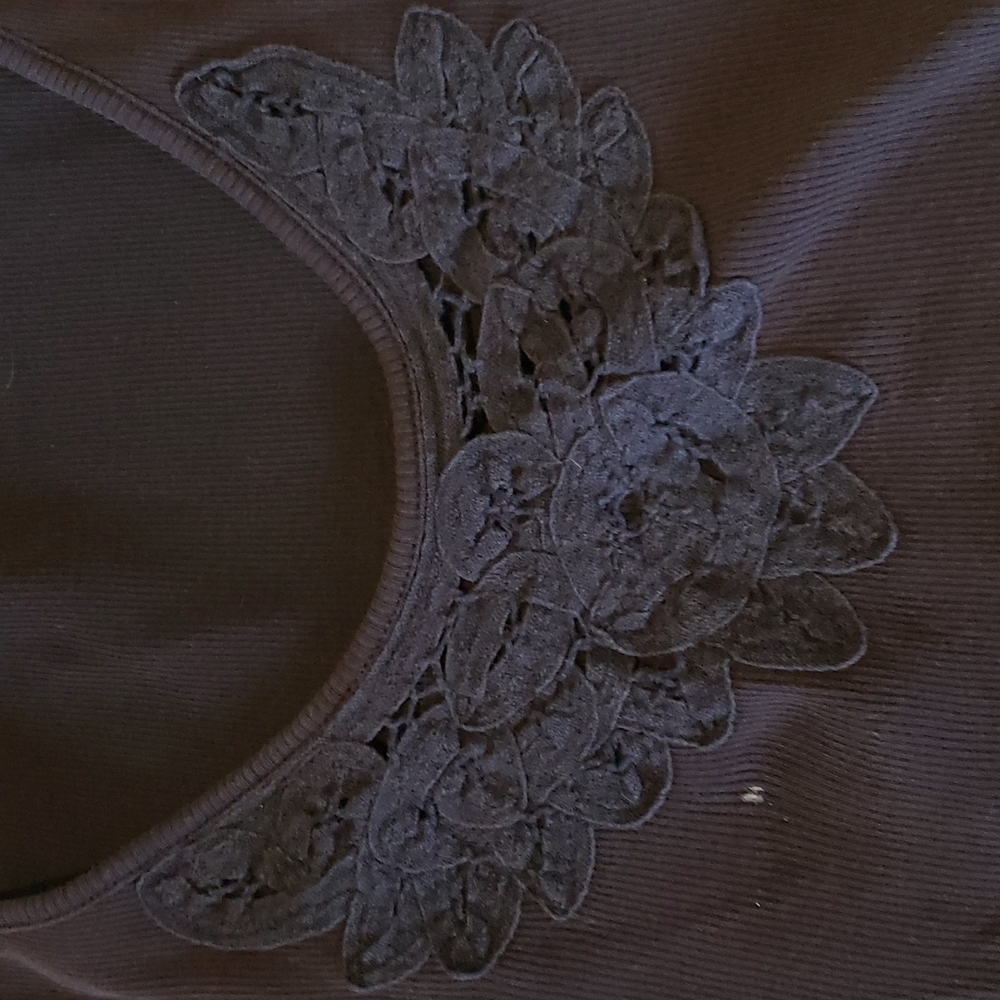 Great condition tank top. Stretchy.  Cute lace design.
